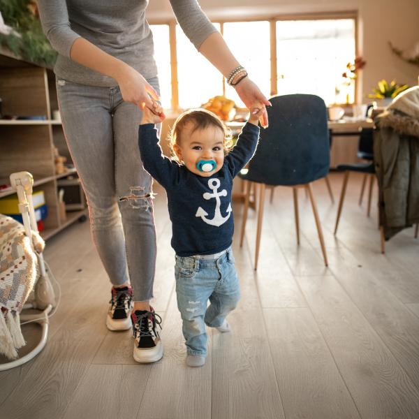 Little boy taking first steps